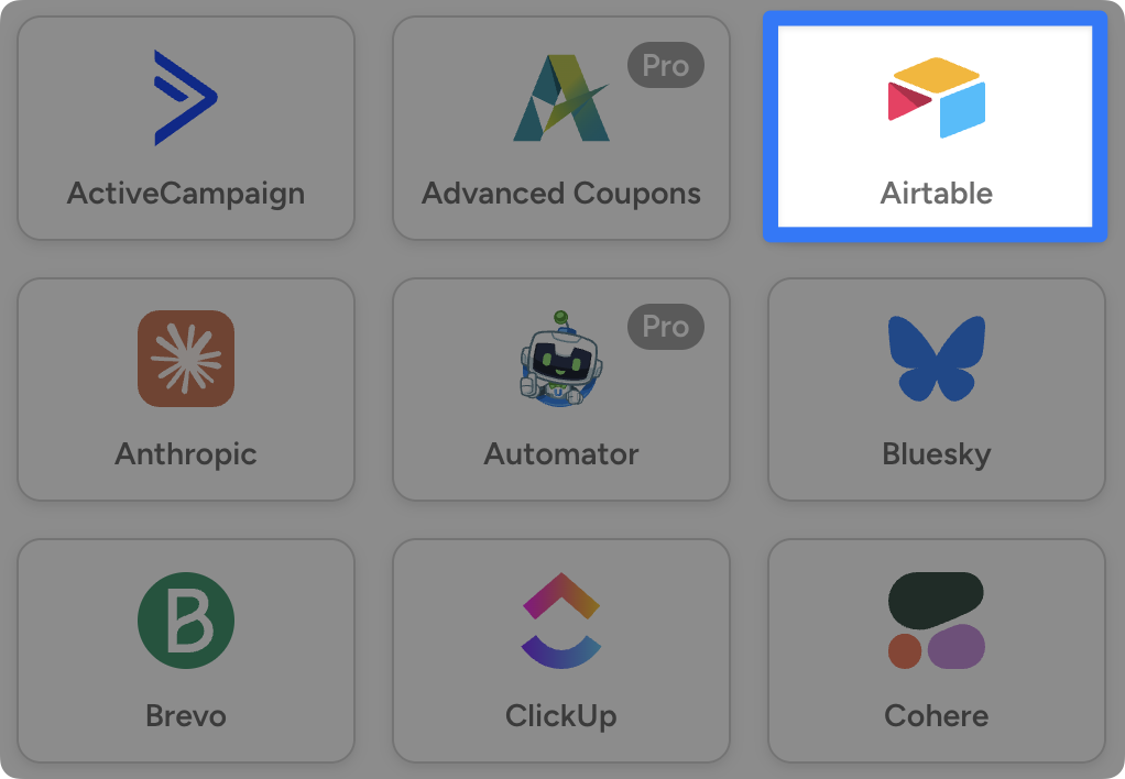 airtable-integration Grid of nine integration service cards arranged in three rows. Top row: ActiveCampaign, Advanced Coupons, and Airtable (selected, highlighted with blue border, showing colorful geometric logo).