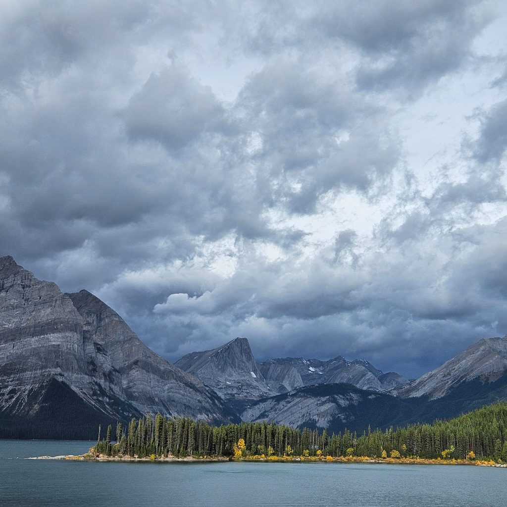 rocky-mountains-grey-clouds-yellow-trees rocky-mountains-grey-clouds-yellow-trees