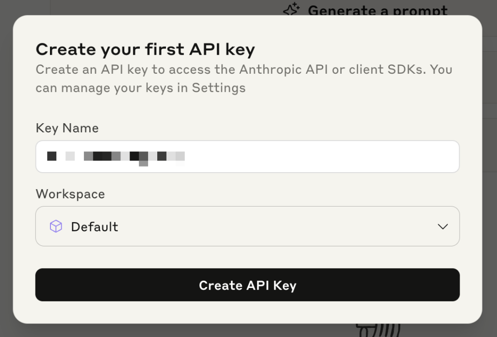 Popup window from the Anthropic Console prompting the user to create their first API key, with fields for key name, workspace selection (set to "Default"), and a button labeled "Create API Key" at the bottom.