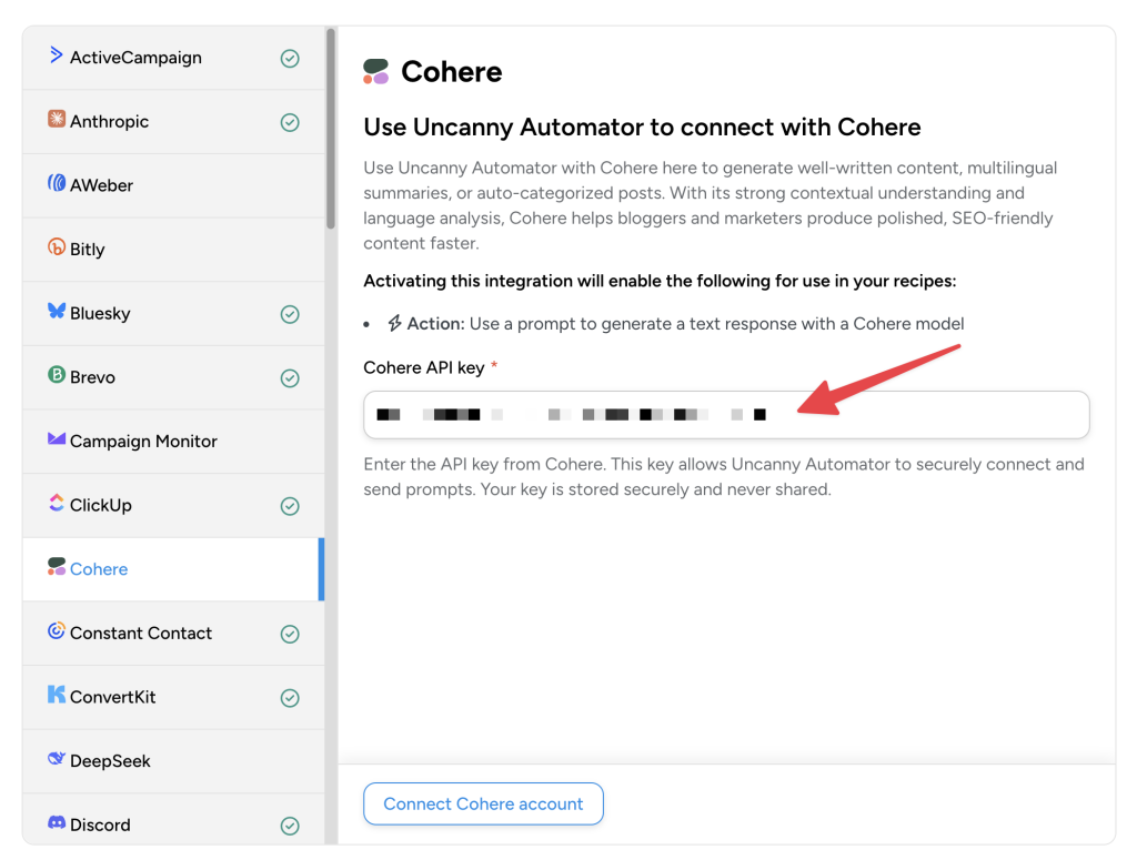 automator-settings-cohere-api-key Uncanny Automator app integration screen for Cohere, with a red arrow pointing to the “Cohere API key” field for users to connect their Cohere account.
