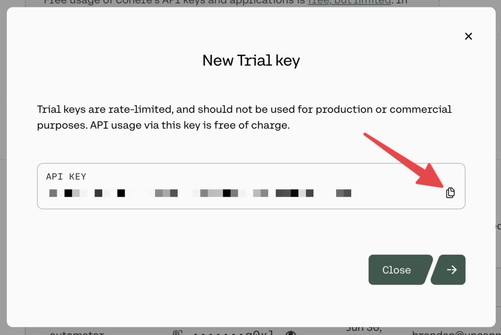copy-cohere-trial-api-key Cohere modal displaying a new API key with a red arrow pointing to the “copy” icon”.