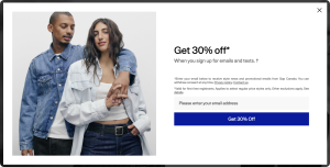 The Gap discount popup featuring an image of a couple on the left and an offer of 30% off for joining the email and text list.