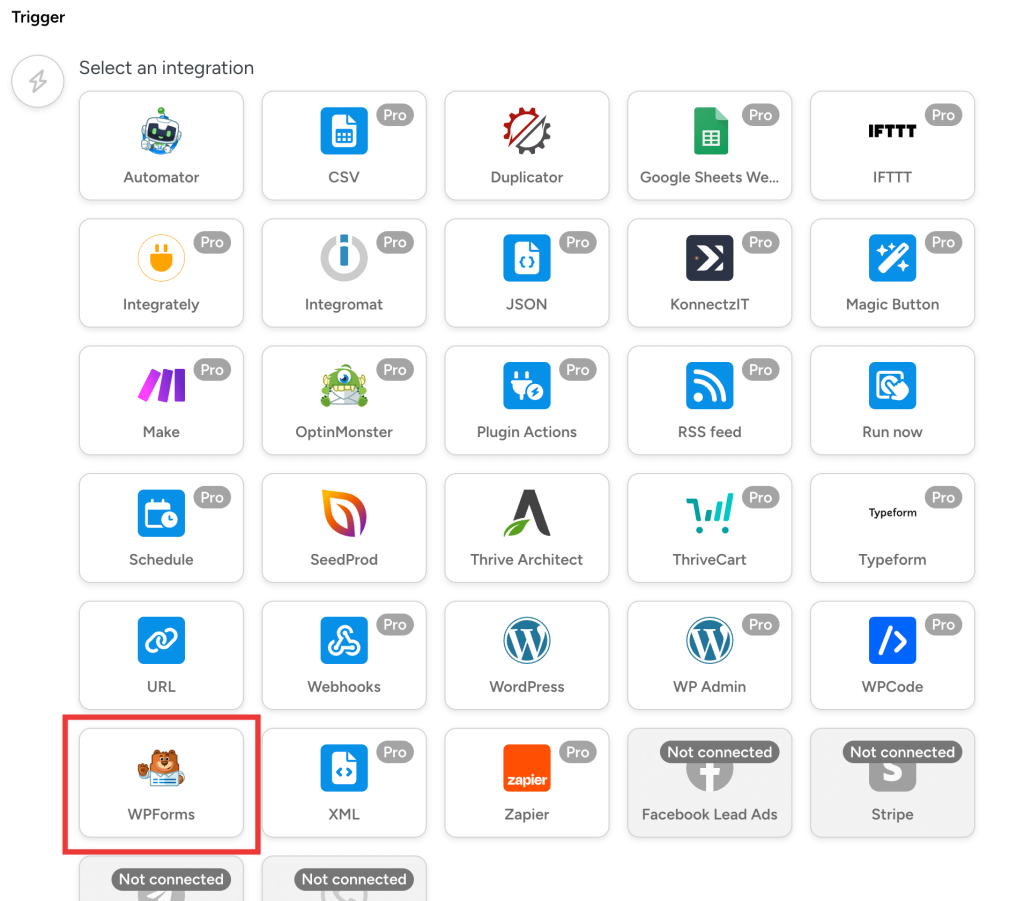 Uncanny Automator integrations grid. The WPForms integration tile is highlighted in a red outline.