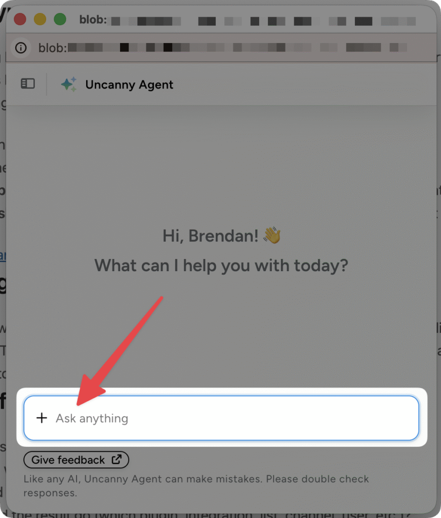 Uncanny Agent chat window greeting a user with a welcome message and a red arrow pointing to the Ask anything input field at the bottom.